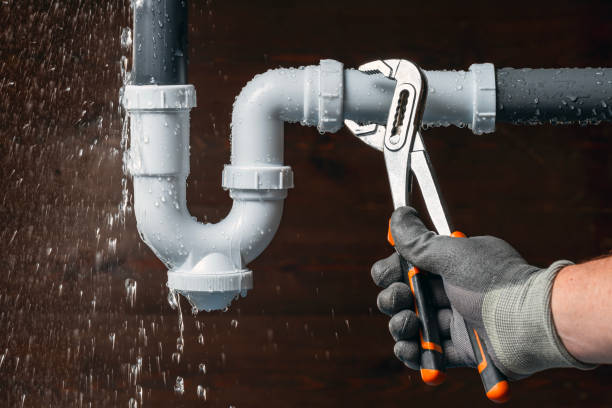 Professional Emergency Plumber technician working in Wellsville, NY